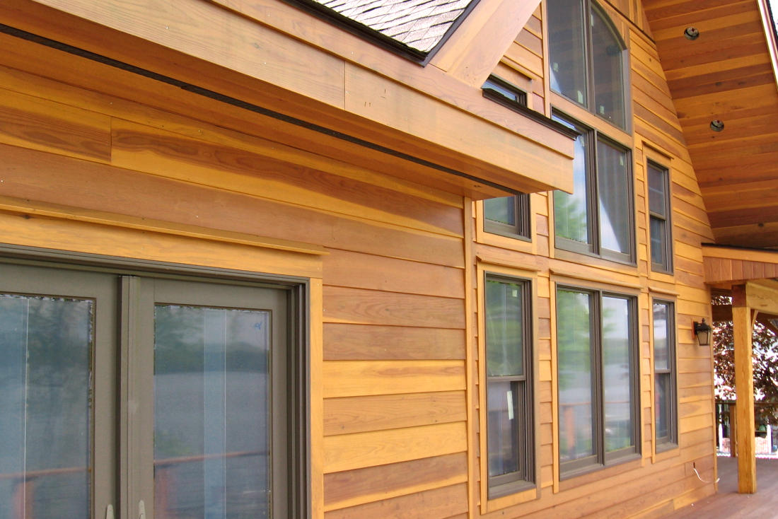 1x8 Rabbeted Bevel Redwood Siding SAP B Near Clear installed on Timberframe Home in New York